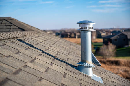 Metal Chimney Stack on New Roof